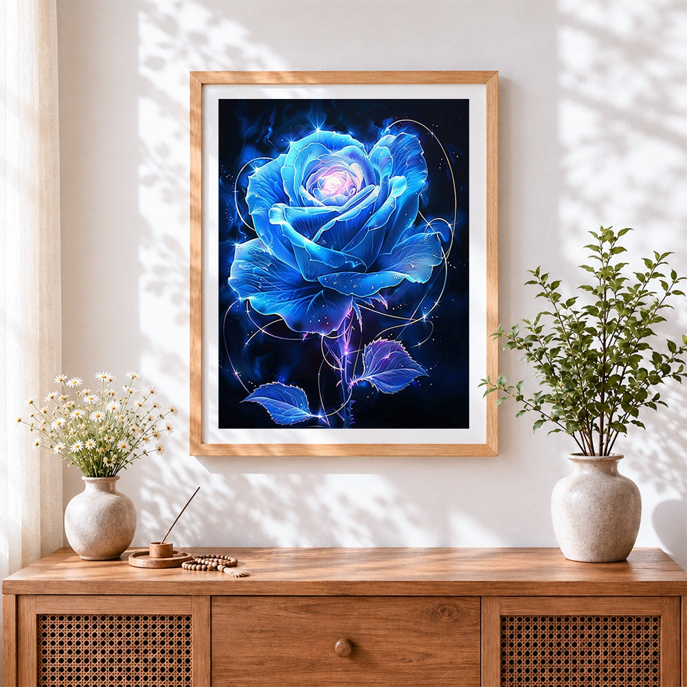Finished glowing blue flower with sparkles cross stitch artwork displayed