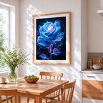 Glowing blue flower with sparkles cross stitch artwork displayed on wall as home decor