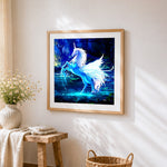 Glowing blue unicorn in a magical forest cross stitch artwork displayed on wall as home decor