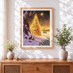Finished glowing forest christmas tree and bunnies cross stitch artwork displayed