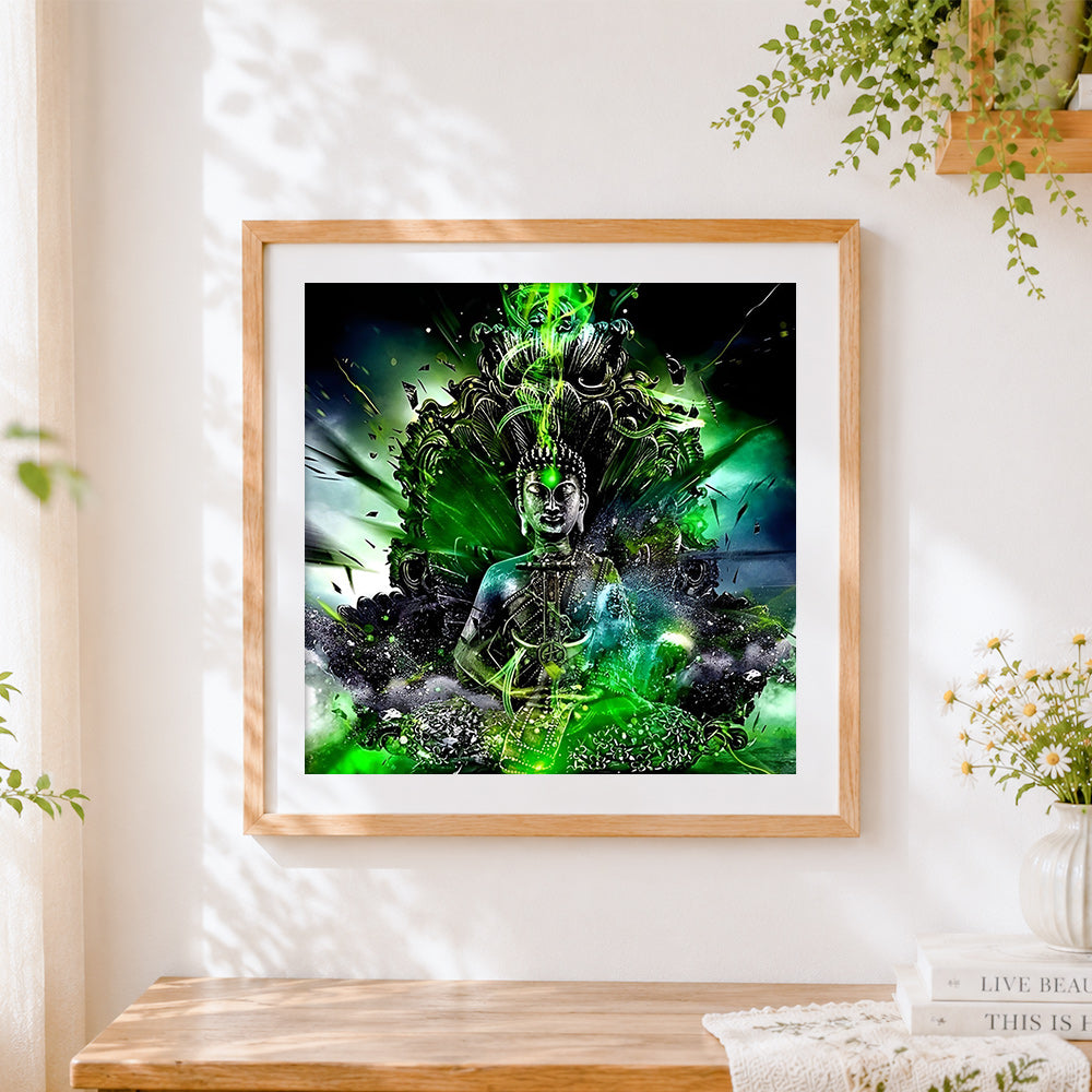 Finished glowing green buddha cross stitch artwork displayed