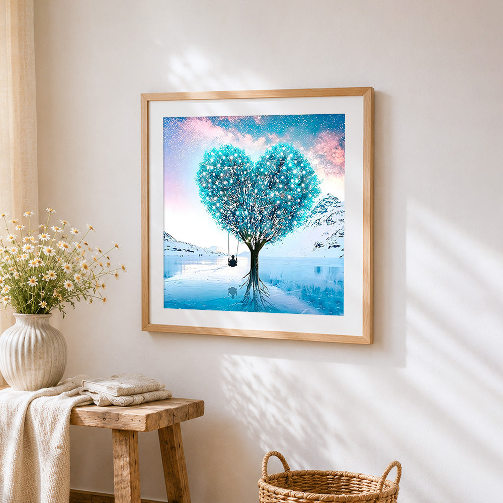 Glowing heart tree with swing cross stitch artwork displayed on wall as home decor