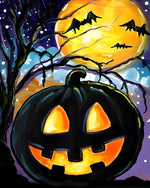 Glowing jack-o'-lantern in a starry night cross stitch kit for beginners