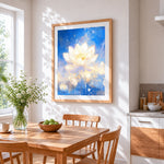 Glowing lotus on blue watercolour cross stitch artwork displayed on wall as home decor