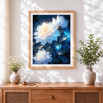 Finished glowing white peonies and butterflies cross stitch artwork displayed