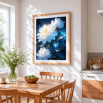 Glowing white peonies and butterflies cross stitch artwork displayed on wall as home decor
