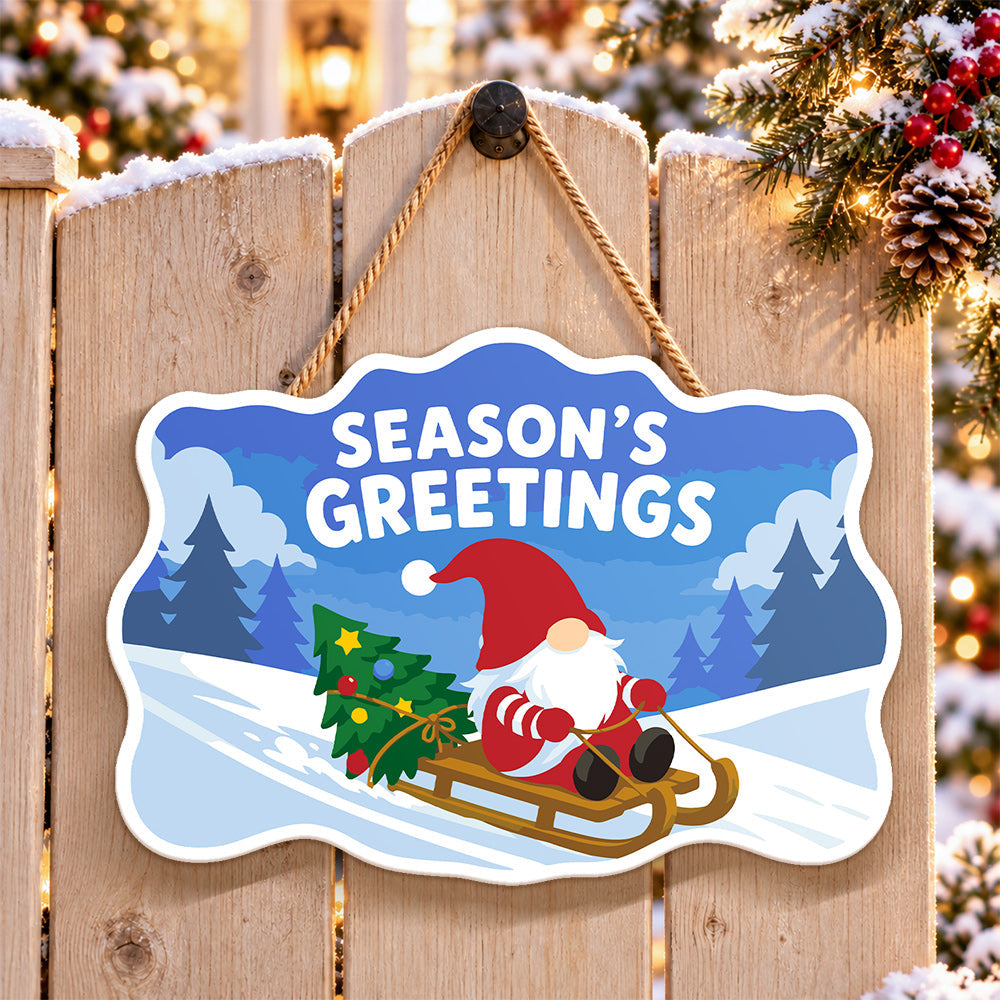 Gnome sled season’s greetings paint by numbers door hanger on a garden gate