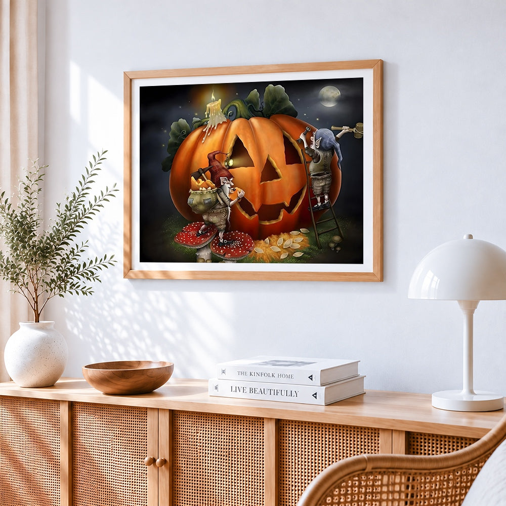Gnomes carving a giant pumpkin cross stitch artwork displayed on wall as home decor