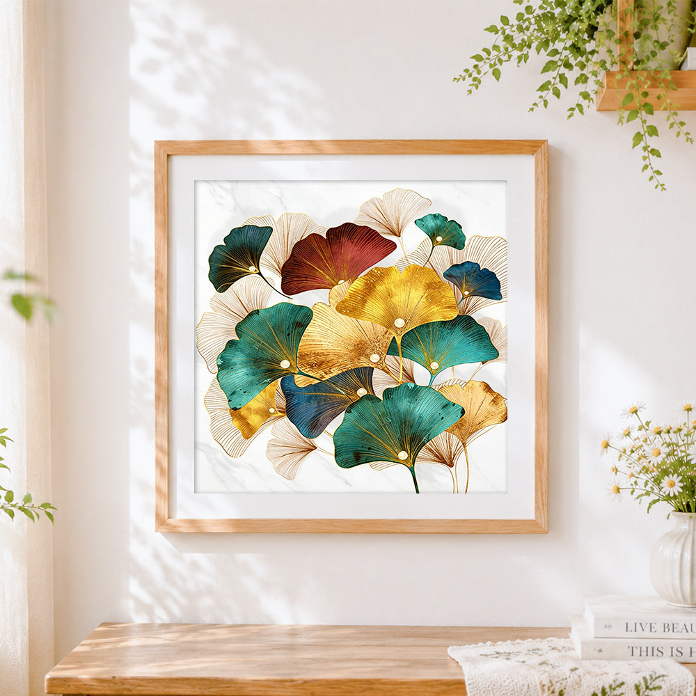Finished gold and green ginkgo leaves cross stitch artwork displayed
