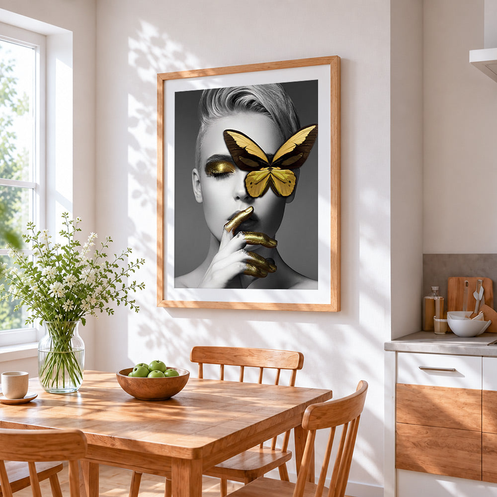 Gold butterfly blindfold portrait cross stitch artwork displayed on wall as home decor