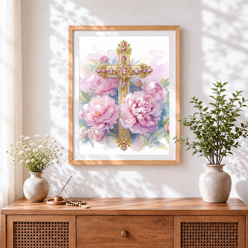 Finished gold cross with pink peonies cross stitch artwork displayed