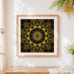 Finished gold geometric mandala cross stitch artwork displayed