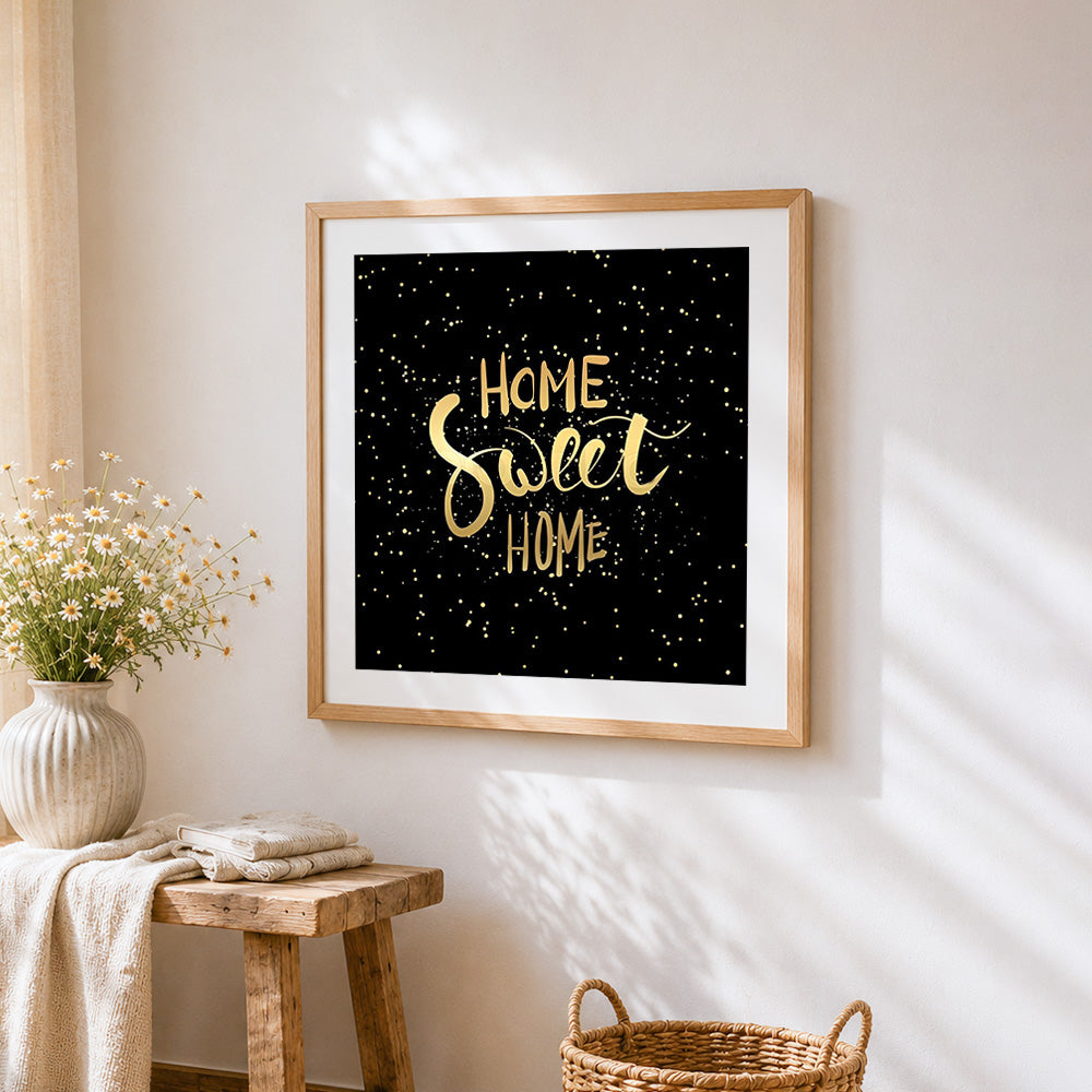 Gold home sweet home on black starry background cross stitch artwork displayed on wall as home decor