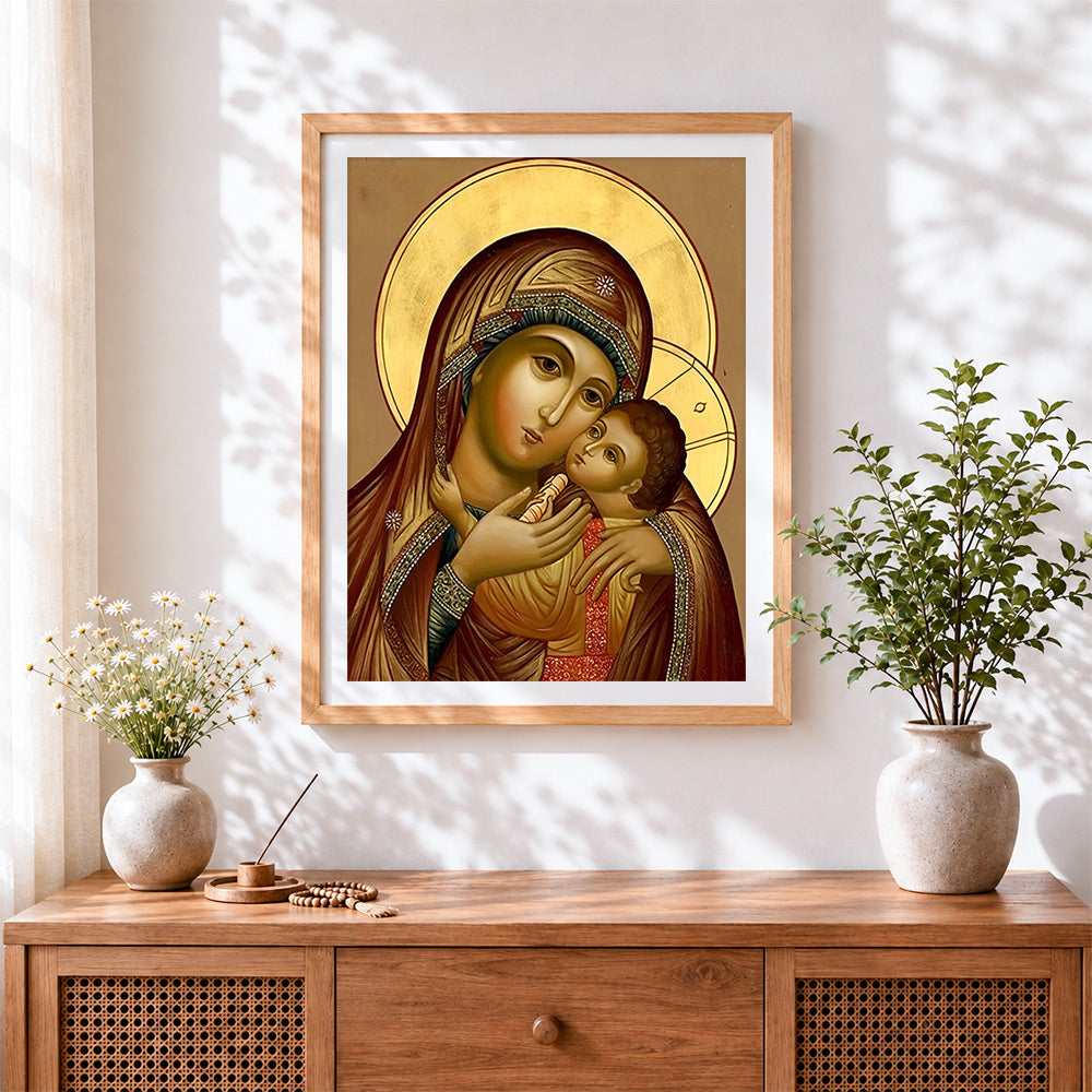 Finished gold icon virgin mary and child cross stitch artwork displayed