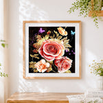 Finished gold leaf roses and butterflies cross stitch artwork displayed