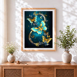 Finished golden and blue metallic butterflies cross stitch artwork displayed
