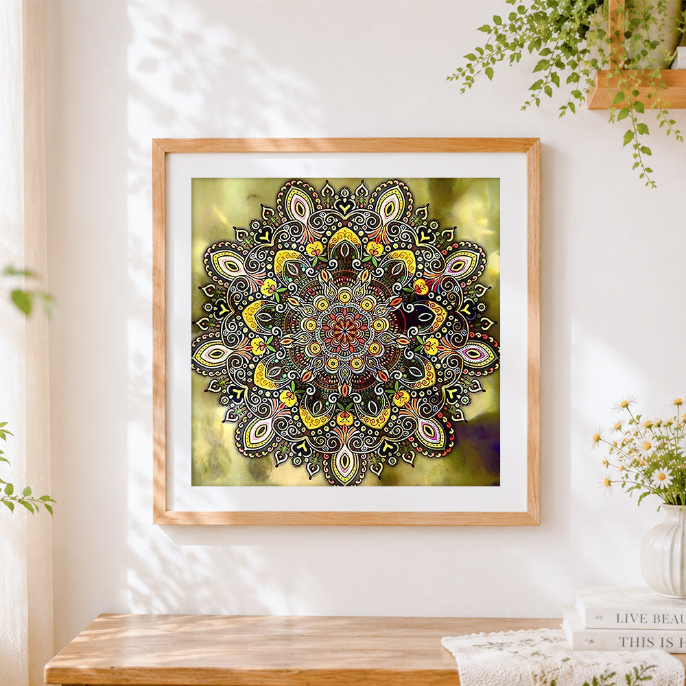 Finished golden and brown intricate mandala cross stitch artwork displayed