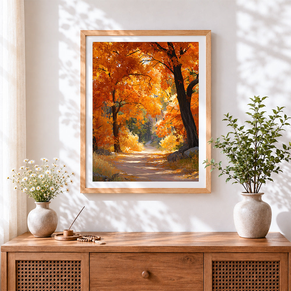 Finished golden autumn forest path cross stitch artwork displayed
