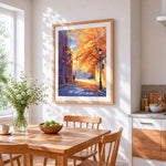 Golden autumn street scene cross stitch artwork displayed on wall as home decor