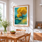 Golden autumn tree by the water cross stitch artwork displayed on wall as home decor