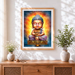 Finished golden baby buddha with halo cross stitch artwork displayed