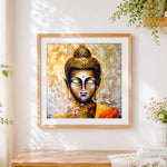 Finished golden buddha cross stitch artwork displayed