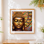 Finished golden buddha with colourful halo cross stitch artwork displayed
