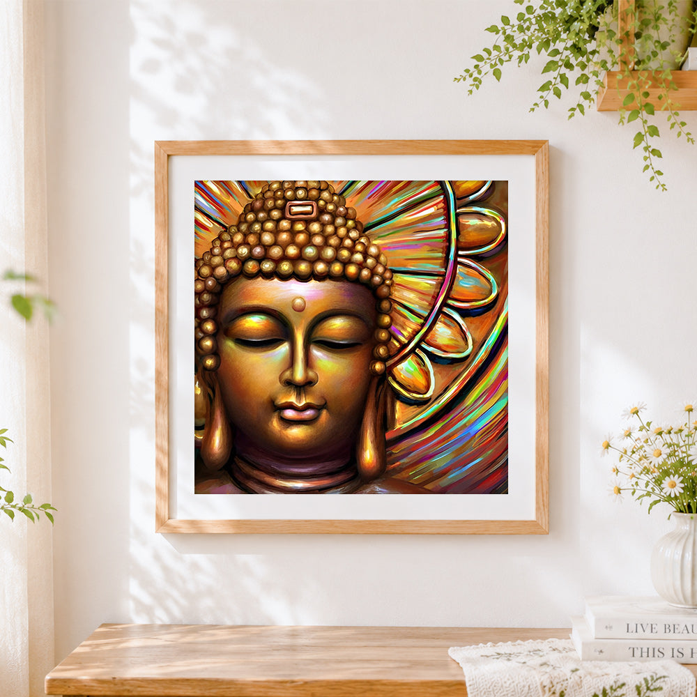 Finished golden buddha with colourful halo cross stitch artwork displayed