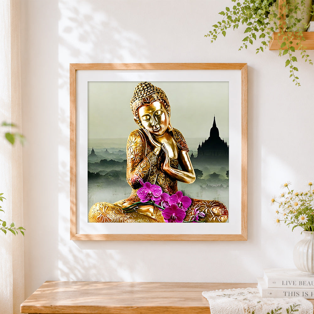 Finished golden buddha with purple orchids cross stitch artwork displayed