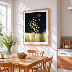 Golden butterflies on black background cross stitch artwork displayed on wall as home decor