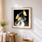 Golden butterflies with sparkling light cross stitch artwork displayed on wall as home decor