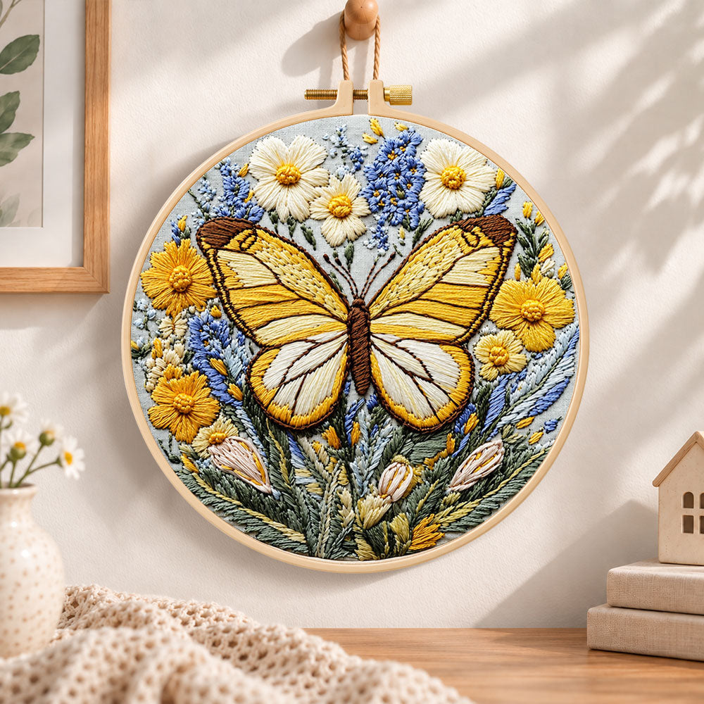 Golden butterfly with daisies embroidery hoop wall art displayed as warm and cozy handmade home decor