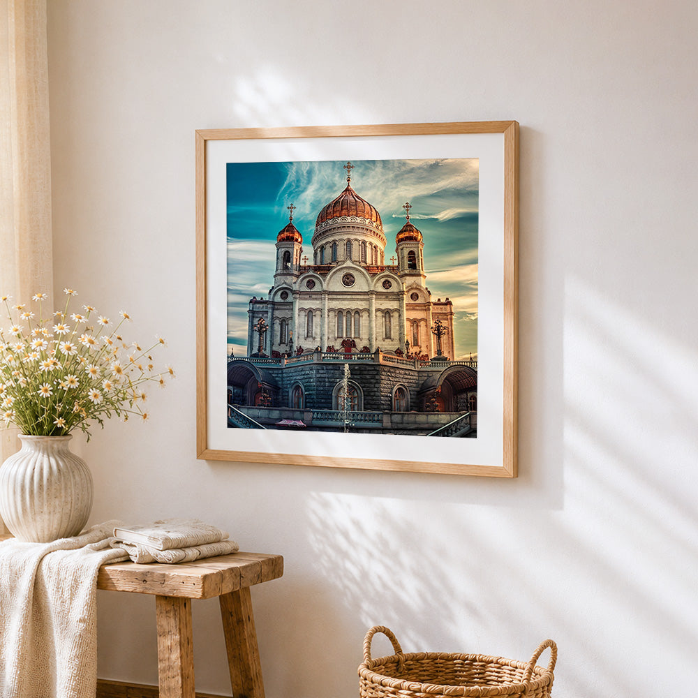 Golden domed cathedral cross stitch artwork displayed on wall as home decor