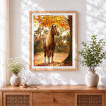 Finished golden horse in autumn sunshine cross stitch artwork displayed