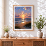 Finished golden hour ocean waves and dune grass cross stitch artwork displayed