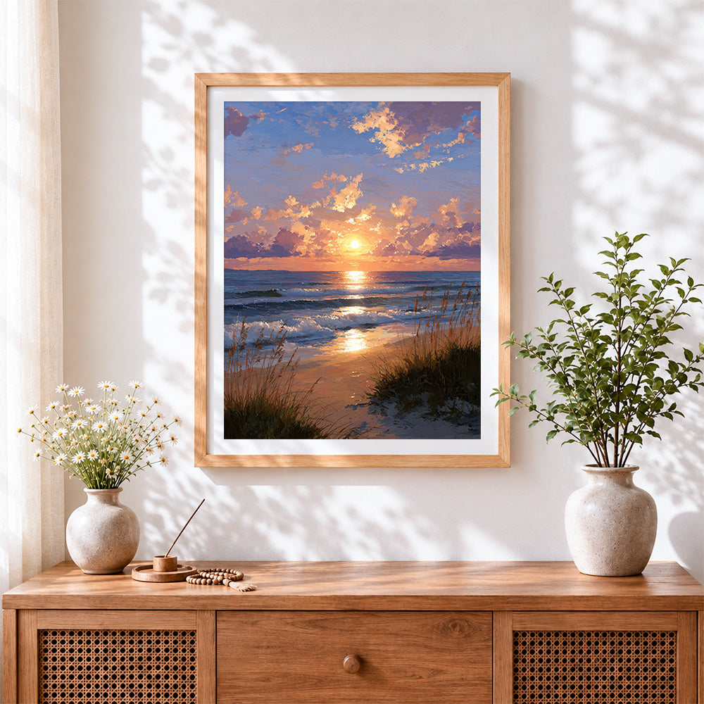 Finished golden hour ocean waves and dune grass cross stitch artwork displayed