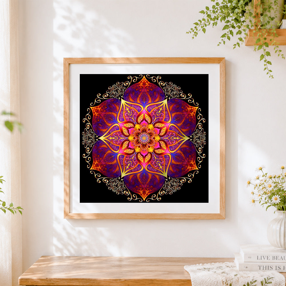 Finished golden orange and purple ornate mandala cross stitch artwork displayed