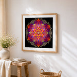 Golden orange and purple ornate mandala cross stitch artwork displayed on wall as home decor