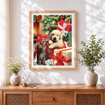 Finished golden puppy and kitten in christmas gift boxes cross stitch artwork displayed