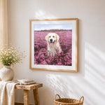 Golden retriever in a pink flower field cross stitch artwork displayed on wall as home decor