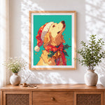 Finished golden retriever in santa hat cross stitch artwork displayed
