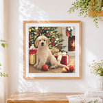 Finished golden retriever puppy by the christmas tree cross stitch artwork displayed