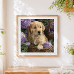 Finished golden retriever puppy in hydrangeas cross stitch artwork displayed