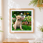 Finished golden retriever puppy in the garden cross stitch artwork displayed