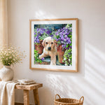 Golden retriever puppy with purple flowers cross stitch artwork displayed on wall as home decor
