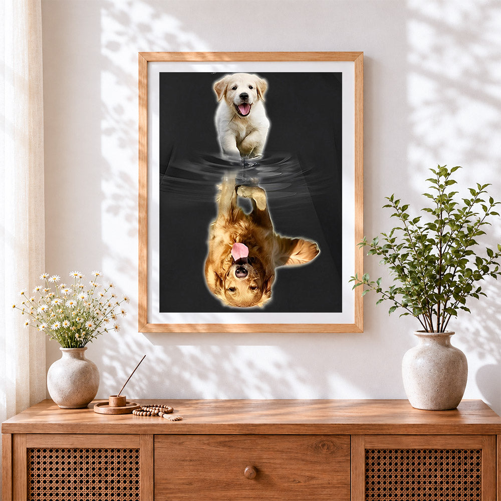 Finished golden retriever water reflection cross stitch artwork displayed