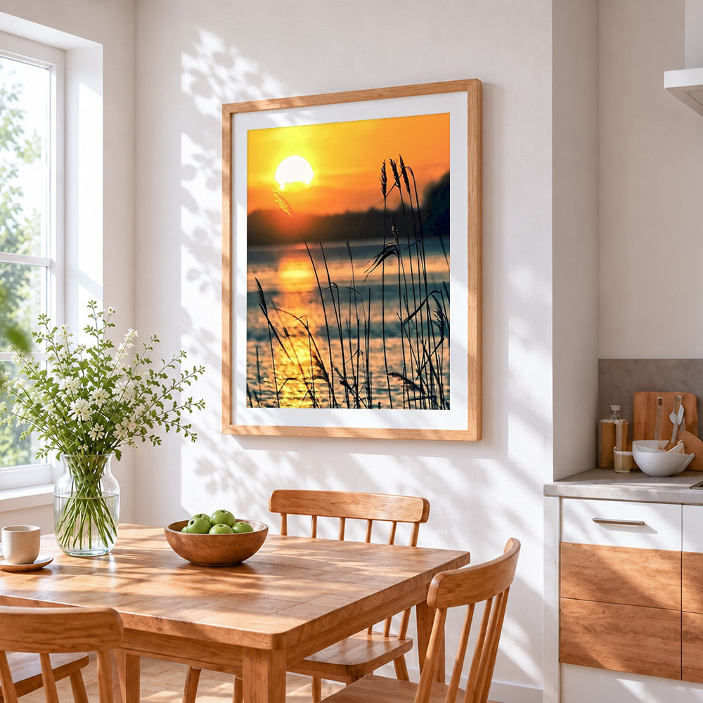 Golden sunset reeds silhouette cross stitch artwork displayed on wall as home decor