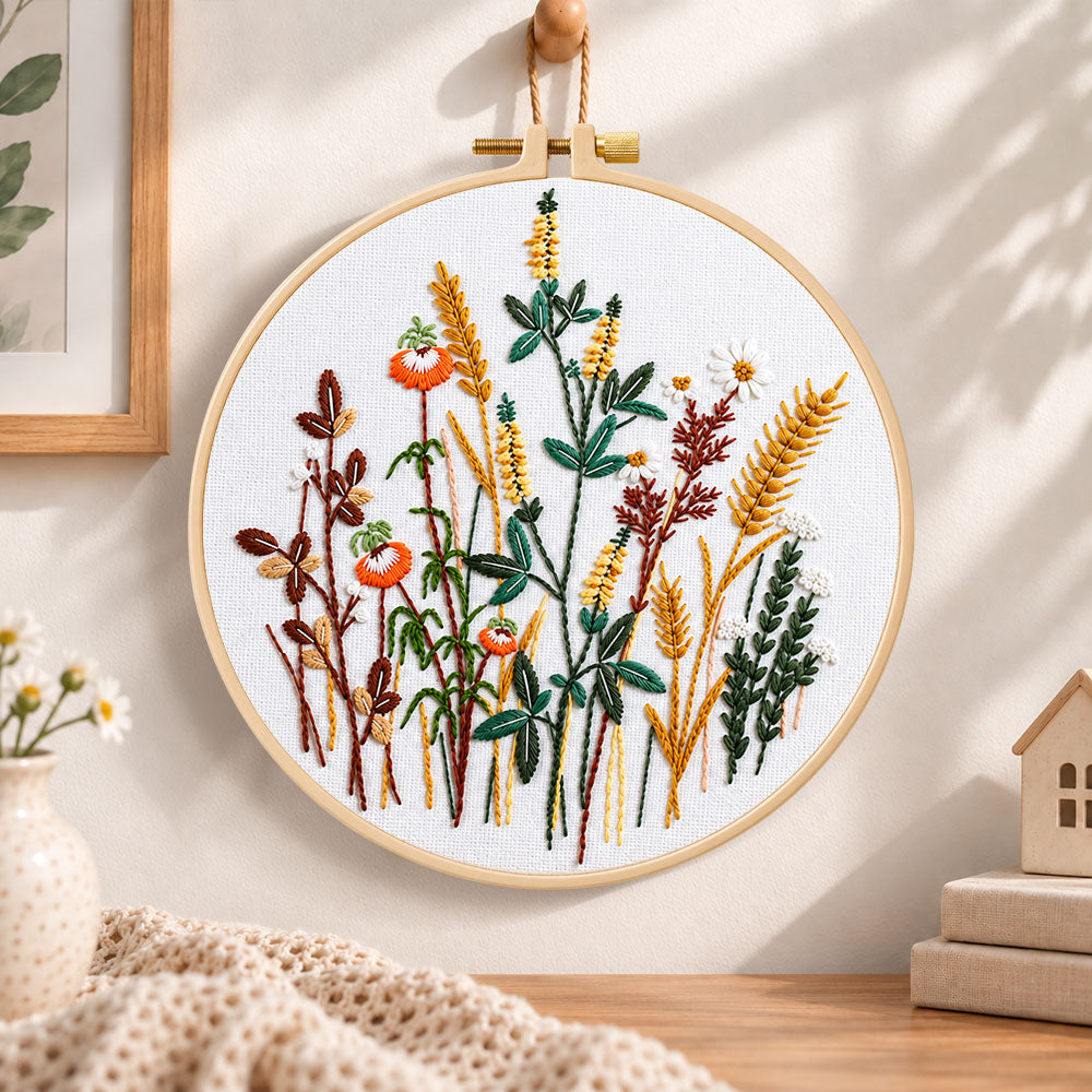 Golden wheat and poppy blooms embroidery hoop wall art displayed as warm and cosy handmade home decor
