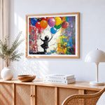 Graffiti girl with balloons cross stitch artwork displayed on wall as home decor