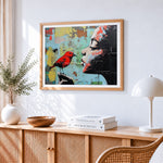 Graffiti girl with red bird cross stitch artwork displayed on wall as home decor